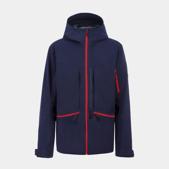 Conduit Shell Navy lightweight technical shell jacket layered for skiing travel and après transitions.